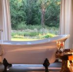 Soak in your private bathtub, listening to the sounds of nature